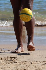 Canvas Print - Playing football on the beach