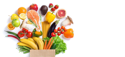 Wall Mural - Healthy food background. Healthy food in paper bag fish, vegetables and fruits on white. Shopping food supermarket concept. Long format with copy space