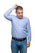 © Krakenimages.com - Middle age arab business man over isolated background confuse and wonder about question. Uncertain with doubt, thinking with hand on head. Pensive concept.