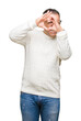 © Krakenimages.com - Middle age arab man wearing glasses over isolated background Doing heart shape with hand and fingers smiling looking through sign