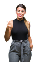 Poster - Young beautiful elegant business woman over isolated background doing happy thumbs up gesture with hand. Approving expression looking at the camera with showing success.