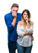 © Krakenimages.com - Young couple in love over isolated background looking stressed and nervous with hands on mouth biting nails. Anxiety problem.