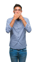 Canvas Print - Adult hispanic man over isolated background shocked covering mouth with hands for mistake. Secret concept.