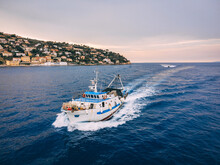 Fishing Trawler Coming Back From The Job Next To The Island In Italy
