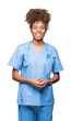 © Krakenimages.com - Young african american doctor woman over isolated background Hands together and fingers crossed smiling relaxed and cheerful. Success and optimistic