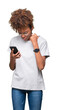 © Krakenimages.com - Young african american woman using smartphone over isolated background annoyed and frustrated shouting with anger, crazy and yelling with raised hand, anger concept