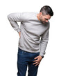 © Krakenimages.com - Young handsome man wearing sweatshirt over isolated background Suffering of backache, touching back with hand, muscular pain