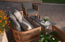 Close Up,wood Sofa And Table Made Of Metal And Wood In The Yard And Garden On The Garden Tiles
