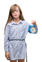 Sticker - Young blonde child holding alarm clock with a happy face standing and smiling with a confident smile showing teeth