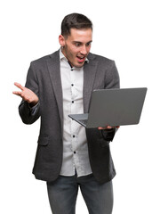 Poster - Handsome young man using computer laptop very happy and excited, winner expression celebrating victory screaming with big smile and raised hands