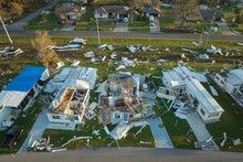 Hurricane Ian Destroyed Homes In Florida Residential Area. Natural Disaster And Its Consequences