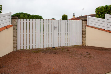 Wall Mural - Aluminum white metal double gate of suburb house