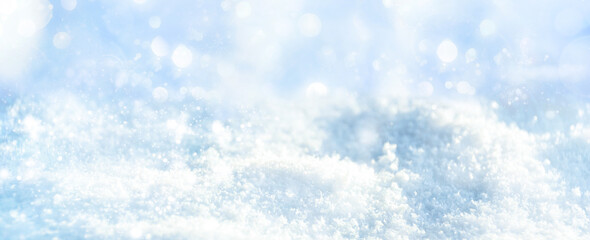 Wall Mural - christmas winter background with blue bokeh light on snow landscape