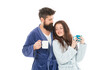 © be free - Spending great time at home. man and woman need relax and energy. everyday routine. good morning coffee. happy family drink tea. couple in love bathrobe. Couple enjoy lazy weekend and drink coffee