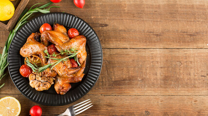 Wall Mural - A plate of delicious roasted chicken wings