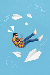 Wall Mural - Vertical collage of flying guy use wireless netbook big paper planes isolated on creative blue background