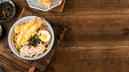 Wall Mural - Japanese Cuisine: Delicious tempura prawn udon noodles