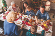 © Impact Photography - Family having Christmas dinner at home