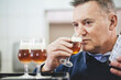 © Photocreo Bednarek - Man tasting craft beer from brewery.