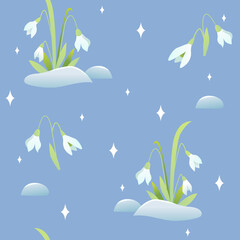 Spring flowers seamless pattern on a blue. Lovely snowdrops background. 