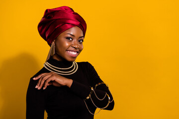 Photo of positive pretty person beaming smile wear ethiopia national outfit isolated on yellow color background