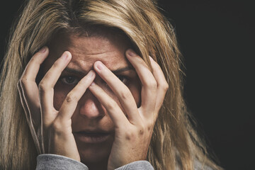 Woman, hands cover or face stress on black background in mental health asylum community or schizophrenia psychology hospital. Anxiety zoom, burnout or depression for fear or counseling scared patient