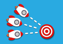 Red Three Rockets Targeting To Hit Center Dartboard. Arrow Dart Aim Goal On Bullseye In Target. Business Success, Investment Goal, Opportunity Challenge, Aim Strategy, Achievement Focus Concept.