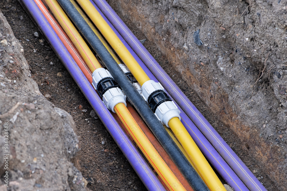 underground electric cable infrastructure installation. Construction ...