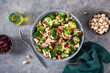 healthy broccoli salad with apple onion dried cranberries pistachio. vegan low carb diet