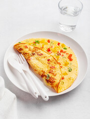 Wall Mural - omelette with tomato, bell pepper onion and cheese. healthy breakfast