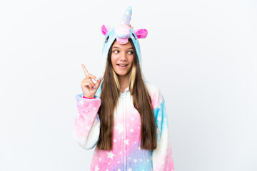 Poster - Little caucasian girl wearing unicorn pajama isolated on white background intending to realizes the solution while lifting a finger up