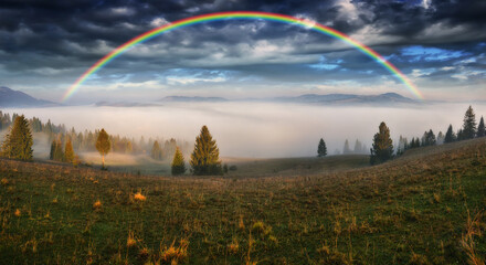 Wall Mural - Rainbow over the Mountains. autumn morning in the Carpathians. Nature of Ukraine