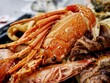 close-up shot of a cooked lobster on a seafood platter with prawn and octopus