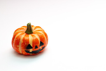 Halloween decorations concept, Scary smiling pumpkin on white background