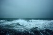 © Youk - sea wave during storm in the ocean with big clouds and rain.