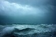 © Youk - sea wave during storm in the ocean with big clouds and rain.