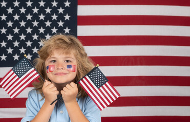 American flag on child cheek, independence day 4th of july. United States of America concept. Fourth of july independence day of the usa. Celebrating Independence Day.