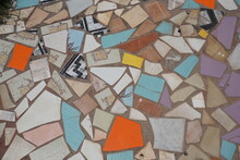 Closeup Of Colorful Broken Pieces Of Ceramic Tiles Walkway  On The Island Of La Réunion