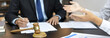 © Puwasit Inyavileart - Client describes the money fraud problem and discusses the solution with a lawyer in the litigation room, Ethics in the courts include justice, legal consultant, Scales of justice, Litigation.