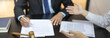 © Puwasit Inyavileart - Client describes the money fraud problem and discusses the solution with a lawyer in the litigation room, Ethics in the courts include justice, legal consultant, Scales of justice, Litigation.