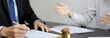 © Puwasit Inyavileart - Client describes the money fraud problem and discusses the solution with a lawyer in the litigation room, Ethics in the courts include justice, legal consultant, Scales of justice, Litigation.