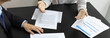© Puwasit Inyavileart - Client describes the money fraud problem and discusses the solution with a lawyer in the litigation room, Ethics in the courts include justice, legal consultant, Scales of justice, Litigation.