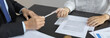 © Puwasit Inyavileart - Attorney or lawyer handing client a pen to sign a business contract, Signing the contract according to the terms and conditions, scales of justice, law hammer, Concept of litigation and legal services