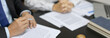 © Puwasit Inyavileart - Lawyers or judges sign documents in accordance with legal and fair terms of agreement, Legal Ethics and Integrity, scales of justice, law hammer, Litigation and legal services.