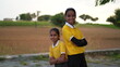 © Govind - Happy smiling indian schoolgirl in school uniform. Portrait of smart Indian girl kid student.