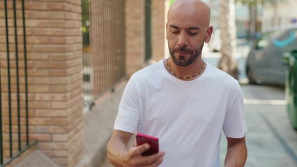 Sticker - Young bald man smiling confident having video call at street