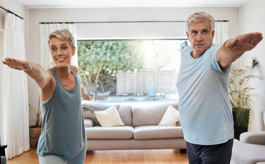 Canvas Print - Yoga, workout and senior couple doing exercise in their home to keep active. Old woman and man doing fitness training in their living room. Healthy lifestyle, wellness and stretching after retirement