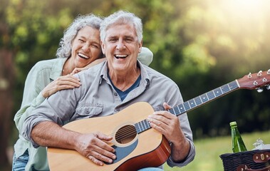 Wall Mural - Couple, guitar and picnic with a senior man and woman in nature with a smile and music for fun. Happy, retirement and love with an elderly male and female pensioner in a park with an instrument