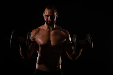 Wall Mural - Portrait of topless guy lifting weights