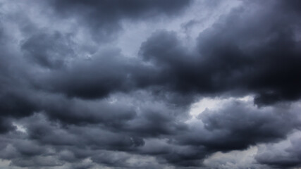 Aufkleber - The dark sky with heavy clouds converging and a violent storm before the rain.Bad or moody weather sky and environment. carbon dioxide emissions, greenhouse effect, global warming, climate change